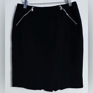 Carlisle Black Pencil Skirt with Front Silver Zippers and Pleated Back Details